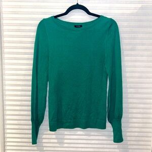 Small, green, halogen light sweater